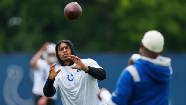 June 14, 2023; Indianapolis, IN, USA; Indianapolis Colts running back Jonathan Taylor (28) passes on the sideline Wednesday, June 14, 2023, during mandatory minicamp at the Indiana Farm Bureau Football Center in Indianapolis.